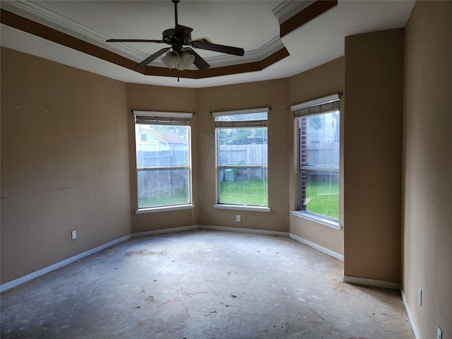 9510 Gentry Shadows Ln, Humble, TX 77396 - empty room featuring a tray ceiling, crown molding, and ceiling fan