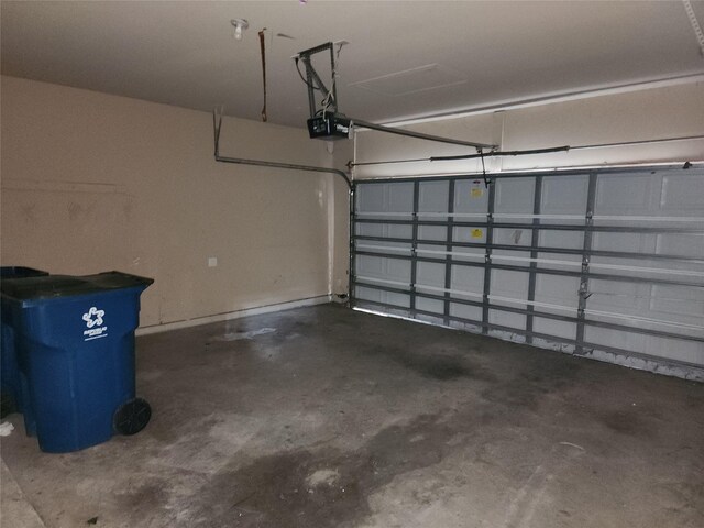 9510 Gentry Shadows Ln, Humble, TX 77396 - garage featuring a garage door opener