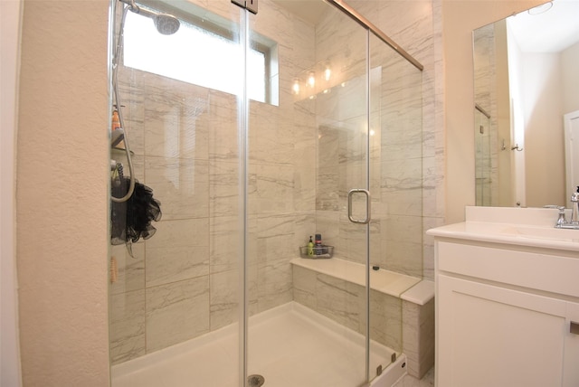 7011 Golden Groundsel Dr, Katy, TX 77493 - bathroom featuring a stall shower and vanity