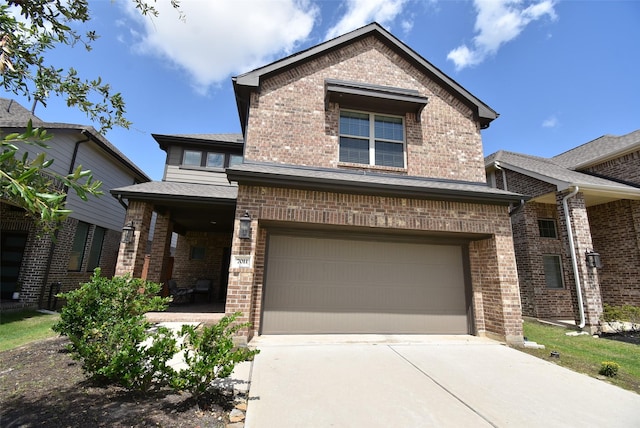 7011 Golden Groundsel Dr, Katy, TX 77493 - view of front facade with brick siding, a garage, and driveway