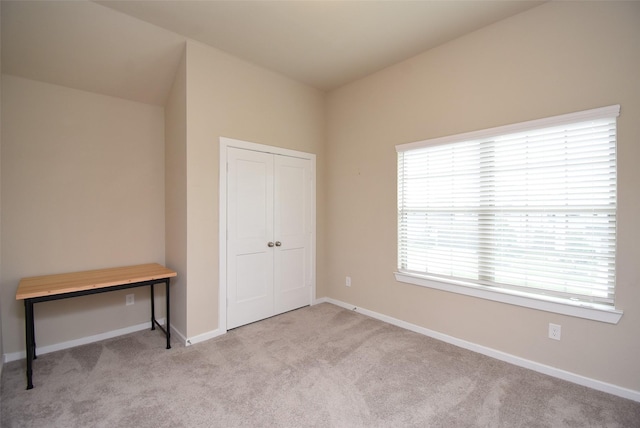 7011 Golden Groundsel Dr, Katy, TX 77493 - unfurnished bedroom featuring carpet floors and a closet