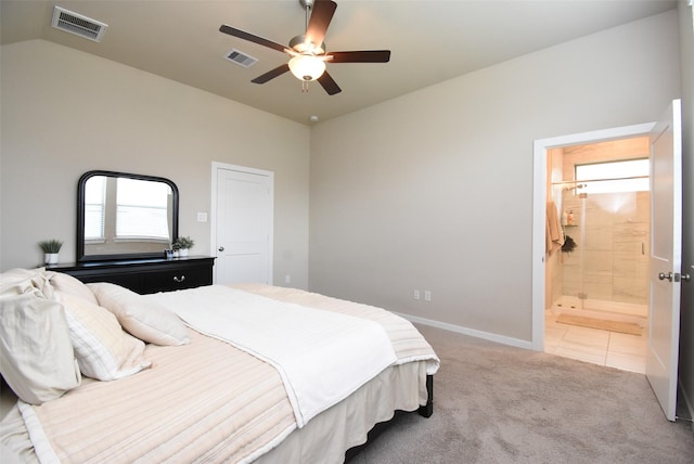 7011 Golden Groundsel Dr, Katy, TX 77493 - bedroom featuring light carpet, ensuite bathroom, a ceiling fan, and lofted ceiling