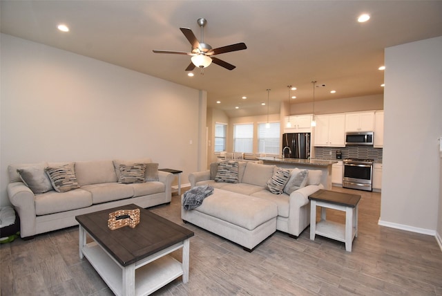 7011 Golden Groundsel Dr, Katy, TX 77493 - living area featuring recessed lighting, a ceiling fan, and wood finished floors