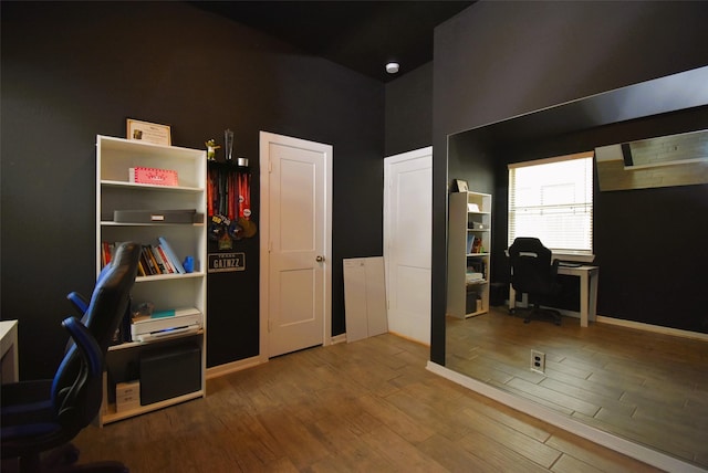 7011 Golden Groundsel Dr, Katy, TX 77493 - office space featuring a towering ceiling and wood finished floors