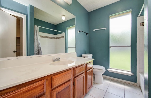 906 Dixie Dr, League City, TX 77573 - full bathroom with vanity, tile patterned floors, and shower / bath combo
