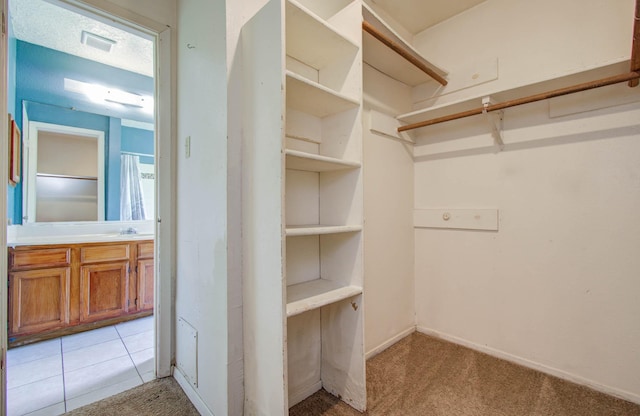 906 Dixie Dr, League City, TX 77573 - walk in closet with light colored carpet