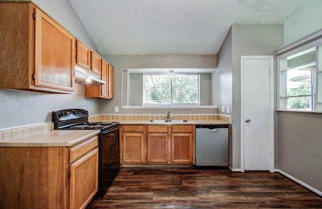 906 Dixie Dr, League City, TX 77573 - kitchen featuring stainless steel dishwasher, electric range, under cabinet range hood, a textured ceiling, and dark wood-type flooring