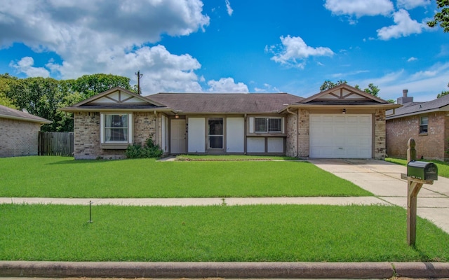 906 Dixie Dr, League City, TX 77573 - single story home featuring concrete driveway, an attached garage, and brick siding
