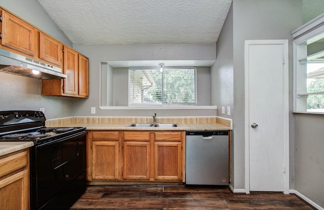 906 Dixie Dr, League City, TX 77573 - kitchen with black electric range, stainless steel dishwasher, under cabinet range hood, light countertops, and dark wood-style floors