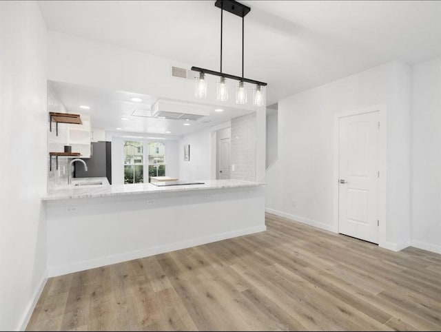 850 Threadneedle St Unit 78, Houston, TX 77079 - unfurnished living room with wood finished floors and recessed lighting