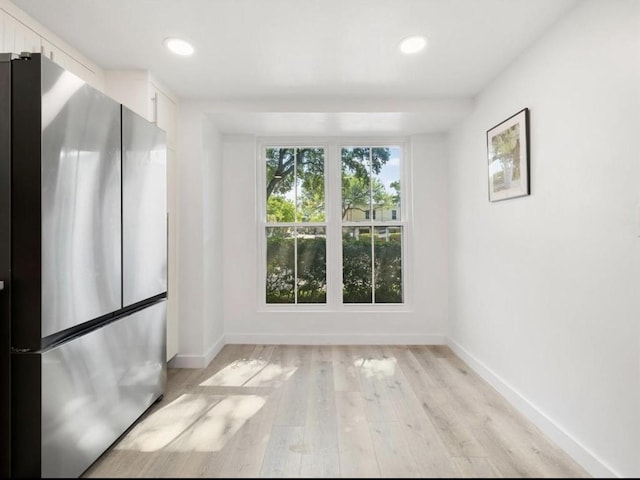 850 Threadneedle St Unit 78, Houston, TX 77079 - unfurnished room with recessed lighting and light wood finished floors
