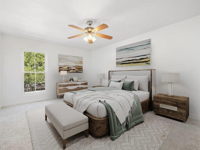 850 Threadneedle St Unit 78, Houston, TX 77079 - bedroom with light colored carpet and a ceiling fan