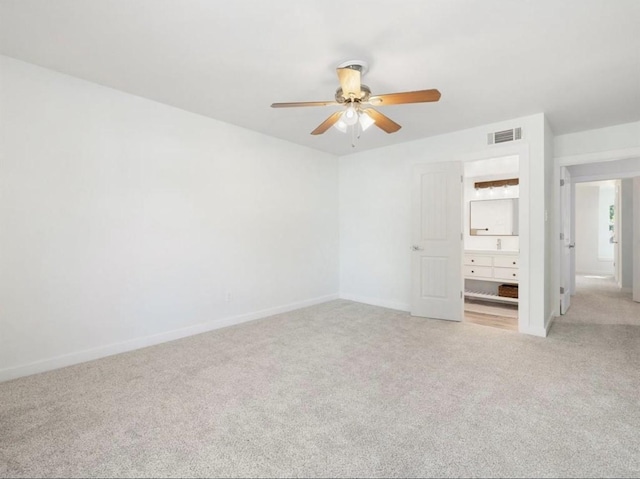 850 Threadneedle St Unit 78, Houston, TX 77079 - unfurnished bedroom featuring light colored carpet and a ceiling fan
