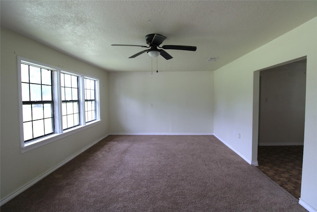 6615 Live Oak Dr, Freeport, TX 77541 - carpeted empty room with ceiling fan and a textured ceiling