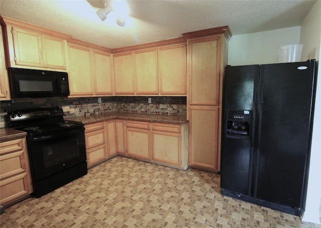 6615 Live Oak Dr, Freeport, TX 77541 - kitchen featuring black appliances, dark countertops, tasteful backsplash, and light brown cabinetry