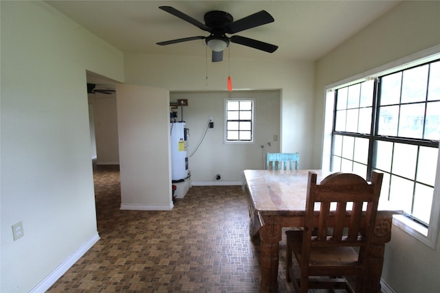6615 Live Oak Dr, Freeport, TX 77541 - dining space featuring water heater and ceiling fan