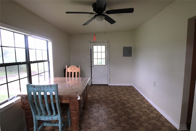 6615 Live Oak Dr, Freeport, TX 77541 - dining area featuring a ceiling fan and electric panel