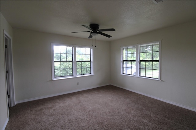 6615 Live Oak Dr, Freeport, TX 77541 - carpeted empty room featuring ceiling fan and a textured ceiling