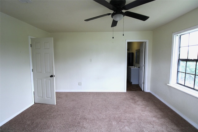 6615 Live Oak Dr, Freeport, TX 77541 - unfurnished room with carpet flooring and a ceiling fan
