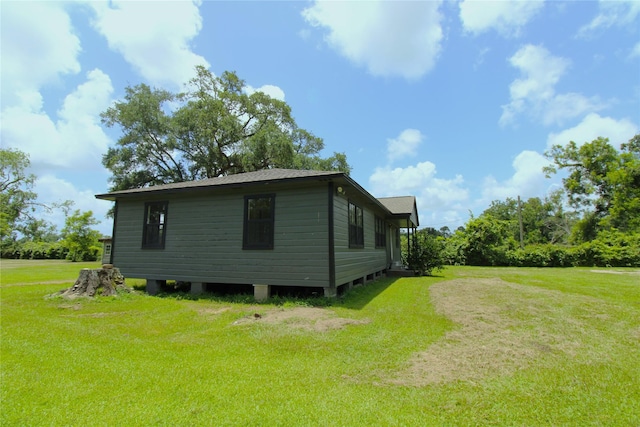 6615 Live Oak Dr, Freeport, TX 77541 - view of property exterior with a yard