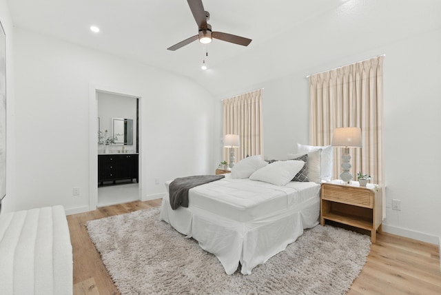 1311 E 35th St, Houston, TX 77022 - bedroom featuring light wood-type flooring, lofted ceiling, ensuite bath, recessed lighting, and a ceiling fan