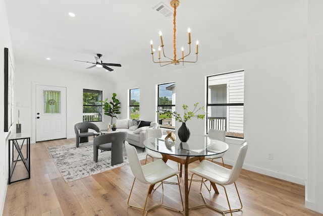 1311 E 35th St, Houston, TX 77022 - dining room with a chandelier, light wood-style floors, a ceiling fan, recessed lighting, and vaulted ceiling
