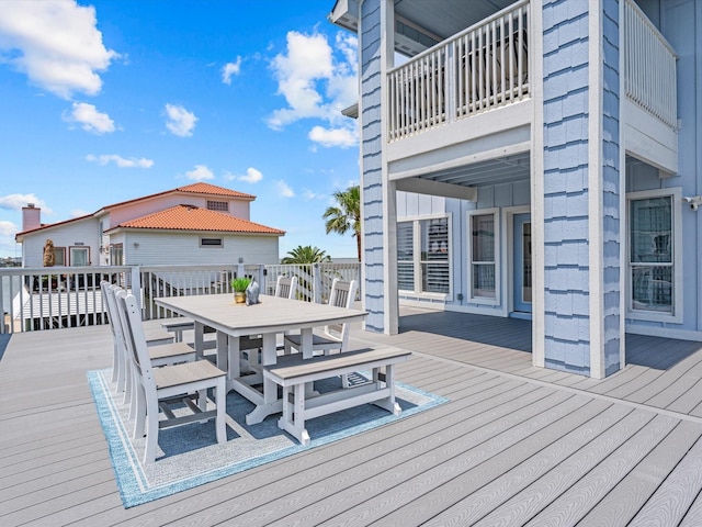 441 Jeanie Lynne Cir, Galveston, TX 77554 - wooden deck with outdoor dining area