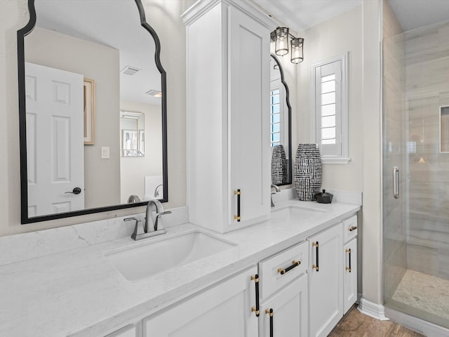 441 Jeanie Lynne Cir, Galveston, TX 77554 - full bathroom with double vanity and a shower stall