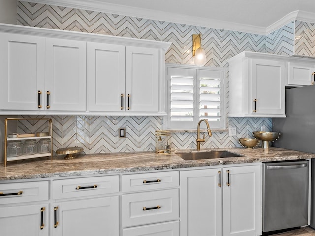 441 Jeanie Lynne Cir, Galveston, TX 77554 - kitchen with crown molding, white cabinetry, backsplash, dishwasher, and light stone countertops