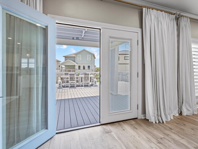 441 Jeanie Lynne Cir, Galveston, TX 77554 - entryway featuring wood finished floors