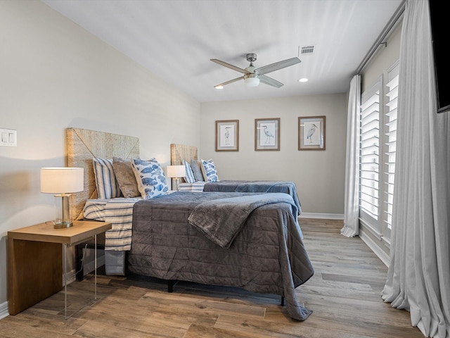 441 Jeanie Lynne Cir, Galveston, TX 77554 - bedroom with wood finished floors, recessed lighting, and ceiling fan