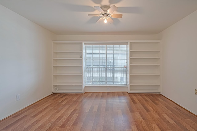 12633 Memorial Dr Unit 250, Houston, TX 77024 - unfurnished room featuring healthy amount of natural light, ceiling fan, and wood finished floors