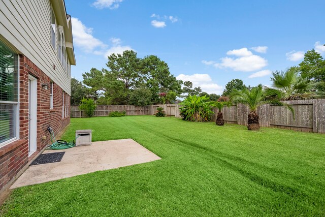 15026 Grape Orchard Ct, Cypress, TX 77433 - fenced backyard featuring a patio area