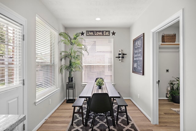 15026 Grape Orchard Ct, Cypress, TX 77433 - dining space with light wood finished floors and recessed lighting