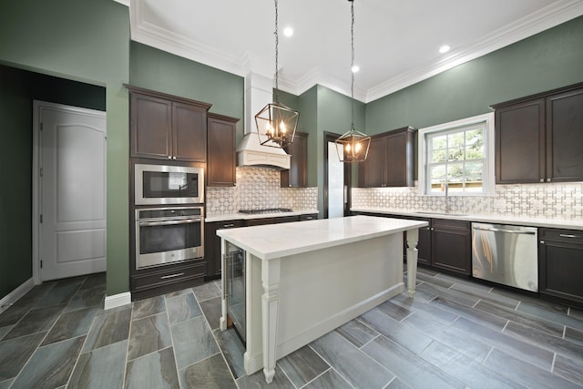 1148 Du Barry Ln, Houston, TX 77018 - kitchen featuring appliances with stainless steel finishes, premium range hood, dark brown cabinets, light countertops, and ornamental molding