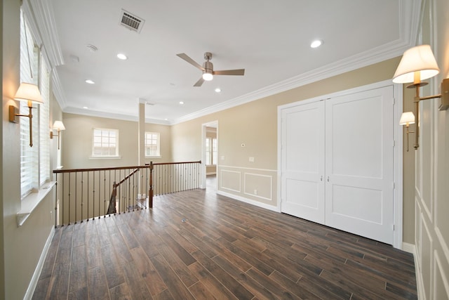 1148 Du Barry Ln, Houston, TX 77018 - empty room featuring a ceiling fan, dark wood finished floors, crown molding, recessed lighting, and wainscoting