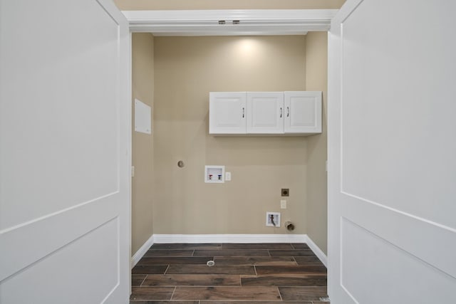 1148 Du Barry Ln, Houston, TX 77018 - laundry area featuring dark wood finished floors, hookup for a washing machine, hookup for a gas dryer, hookup for an electric dryer, and cabinet space