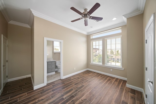 1148 Du Barry Ln, Houston, TX 77018 - unfurnished bedroom featuring multiple windows, dark wood-style floors, ornamental molding, recessed lighting, and ensuite bathroom