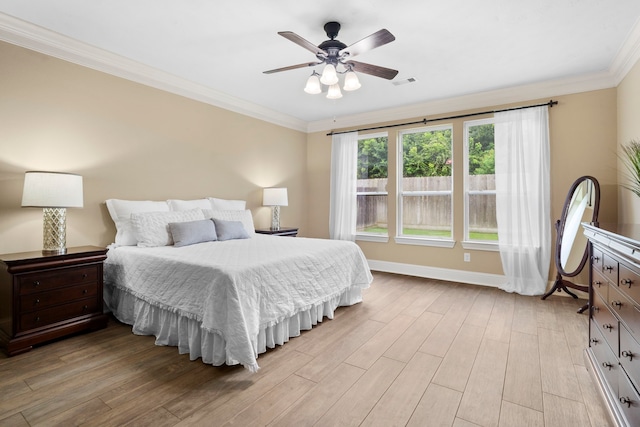 10522 Ginger Gln, Missouri City, TX 77459 - bedroom with light wood-type flooring, crown molding, and a ceiling fan