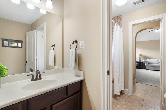 10522 Ginger Gln, Missouri City, TX 77459 - full bath featuring vanity, tile patterned floors, and a shower with curtain