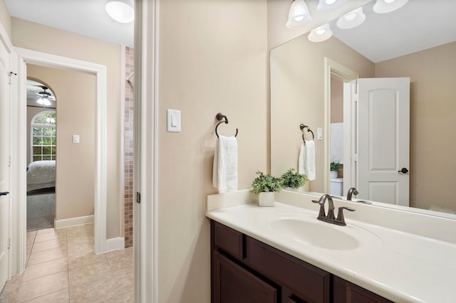 10522 Ginger Gln, Missouri City, TX 77459 - bathroom featuring vanity, ensuite bath, and tile patterned flooring