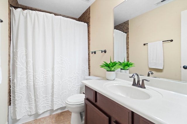 10522 Ginger Gln, Missouri City, TX 77459 - bathroom featuring vanity, tile patterned flooring, and shower / bath combination with curtain