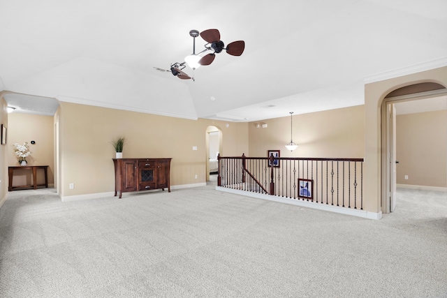 10522 Ginger Gln, Missouri City, TX 77459 - unfurnished room featuring arched walkways, lofted ceiling, and light colored carpet