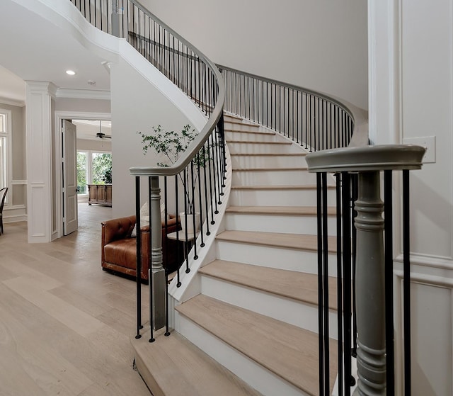 303 S Silvershire Cir, The Woodlands, TX 77381 - stairs with wood finished floors, decorative columns, crown molding, and recessed lighting