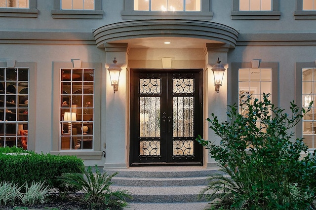 303 S Silvershire Cir, The Woodlands, TX 77381 - view of exterior entry with stucco siding