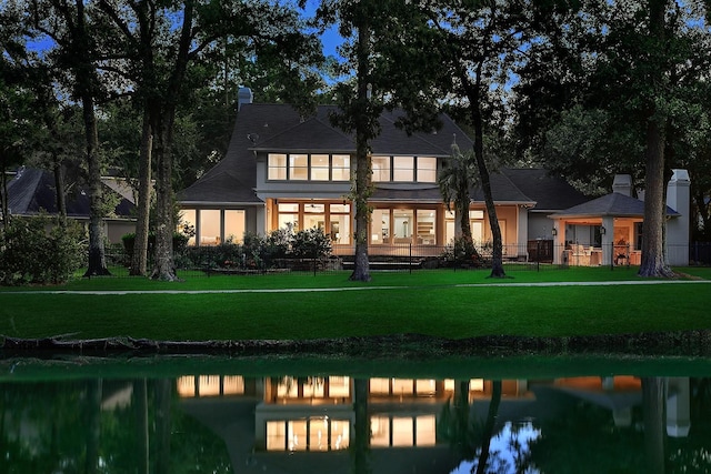 303 S Silvershire Cir, The Woodlands, TX 77381 - rear view of house featuring a water view