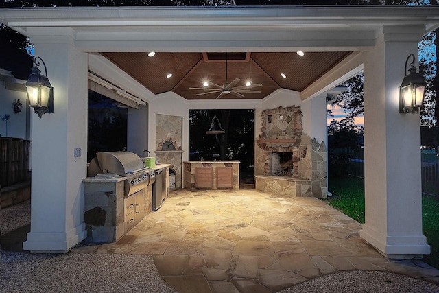 303 S Silvershire Cir, The Woodlands, TX 77381 - view of patio / terrace featuring an outdoor stone fireplace, an outdoor kitchen, a ceiling fan, and a gazebo