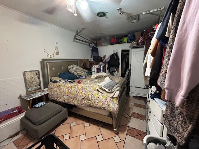 1114 Elton St, Houston, TX 77034 - tiled bedroom with a garage