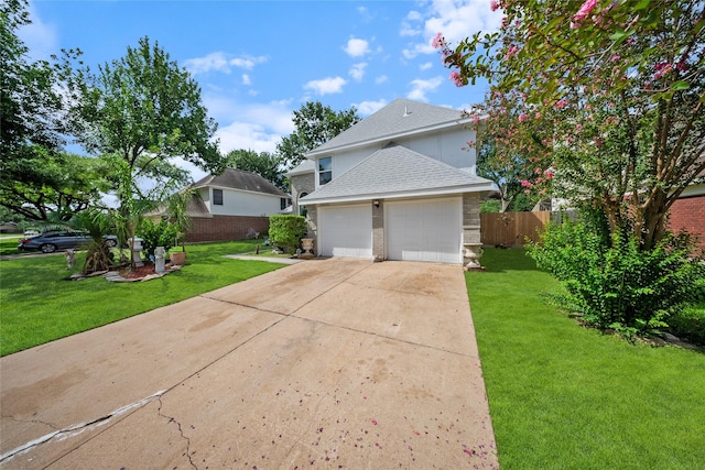 10135 Wayward Wind Ln, Houston, TX 77064 - view of front of property featuring driveway, a shingled roof, a garage, and brick siding