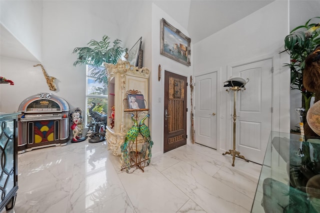 10135 Wayward Wind Ln, Houston, TX 77064 - foyer entrance featuring a high ceiling and marble finish flooring